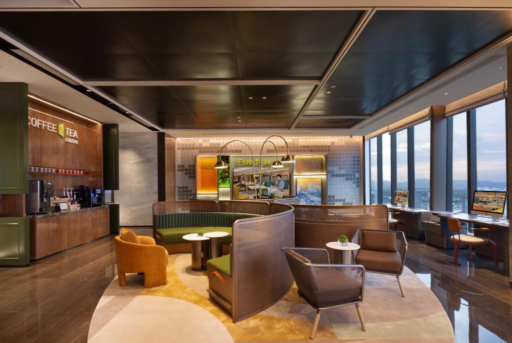 Istumisnurk majutusasutuses Home2 Suite by Hilton Yiwu World Trade Center