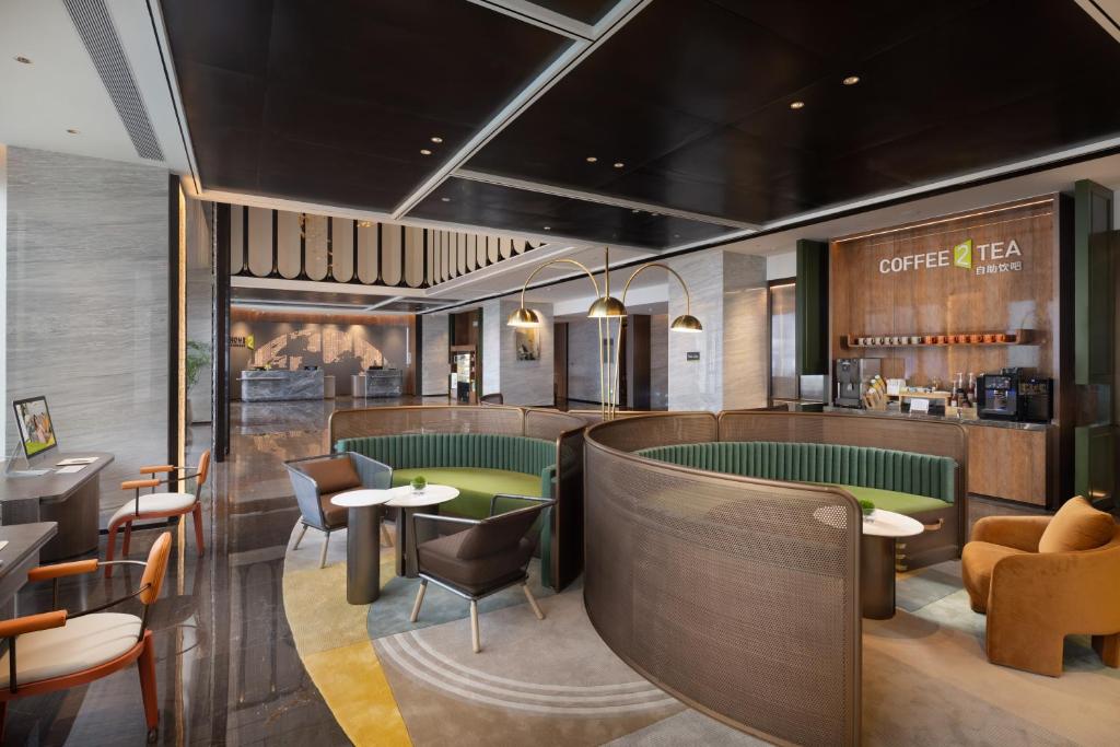 Istumisnurk majutusasutuses Home2 Suite by Hilton Yiwu World Trade Center