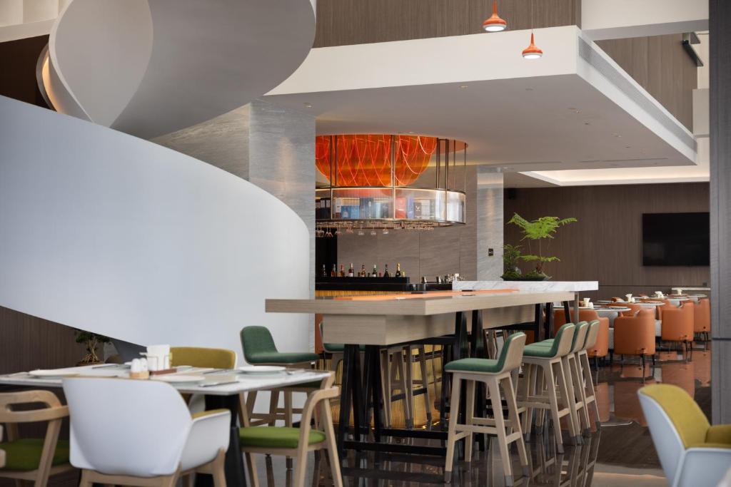 Istumisnurk majutusasutuses Home2 Suite by Hilton Yiwu World Trade Center