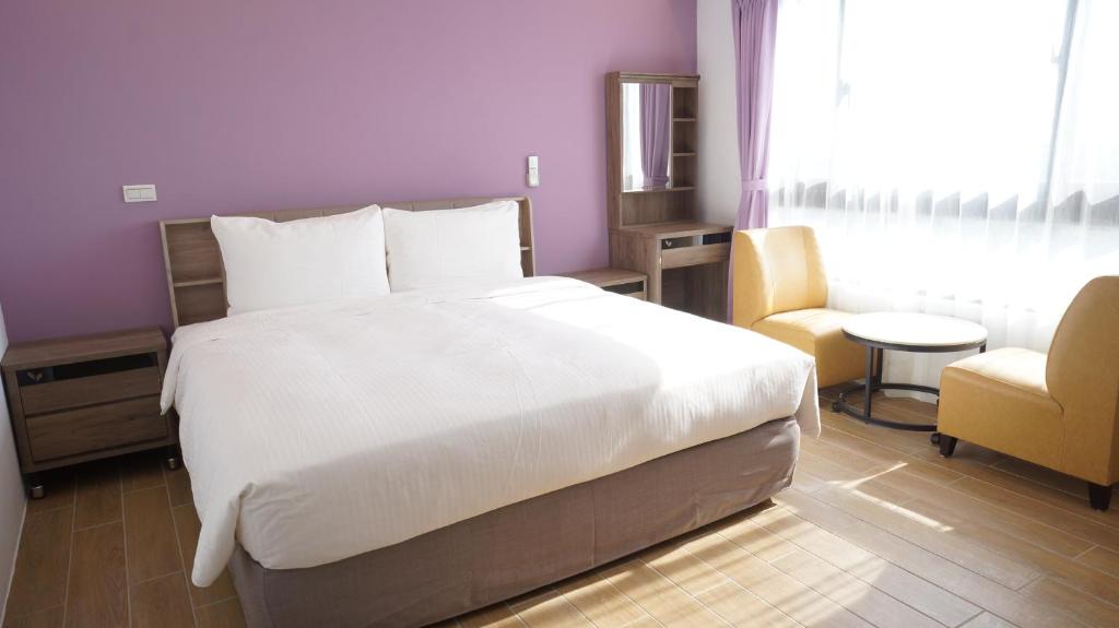 Postel nebo postele na pokoji v ubytování Lukang Holiday Hostel