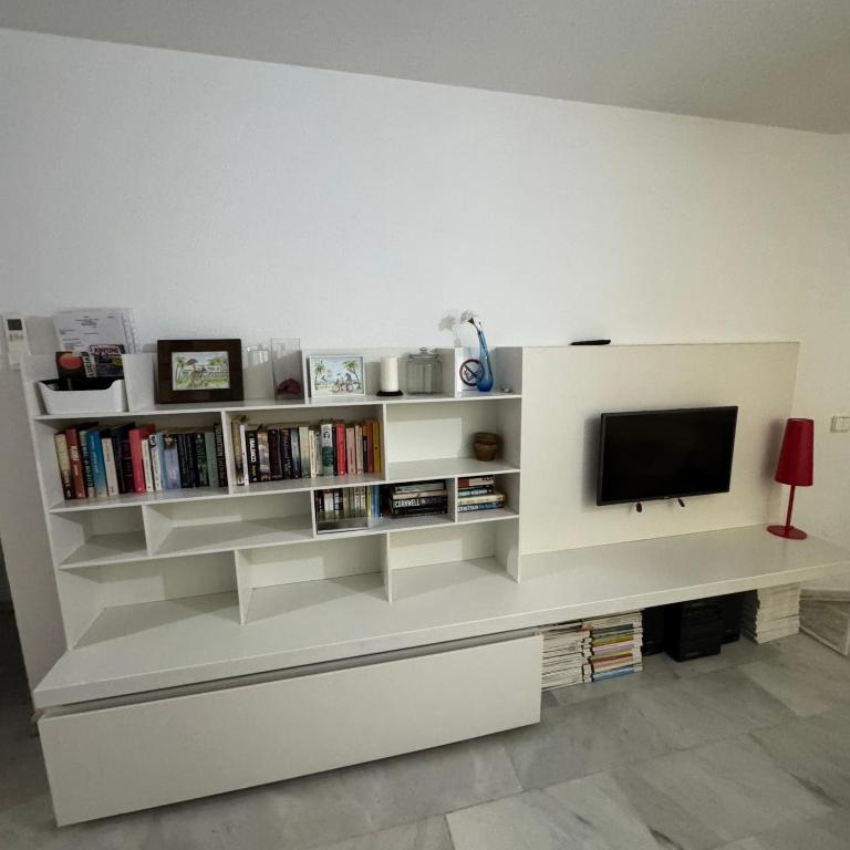 Televízia a/alebo spoločenská miestnosť v ubytovaní M&J Benalmadena Retreat