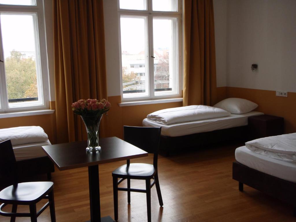 Postel nebo postele na pokoji v ubytování Grand Hostel Berlin Classic