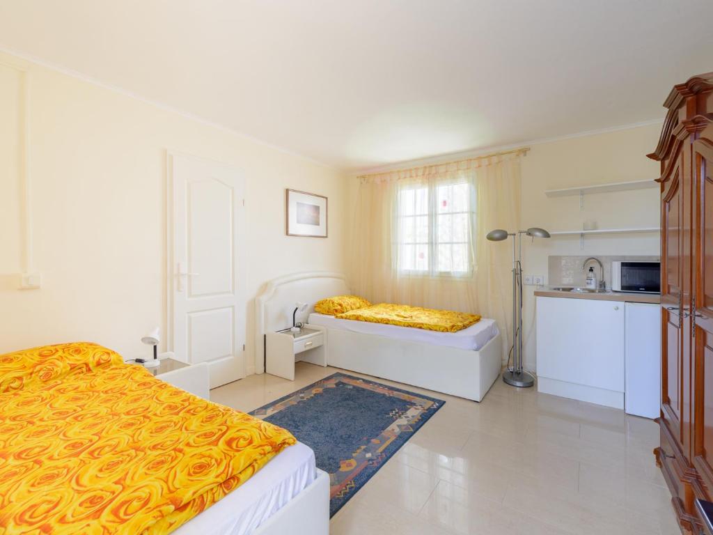 A bed or beds in a room at Villa Fortuna