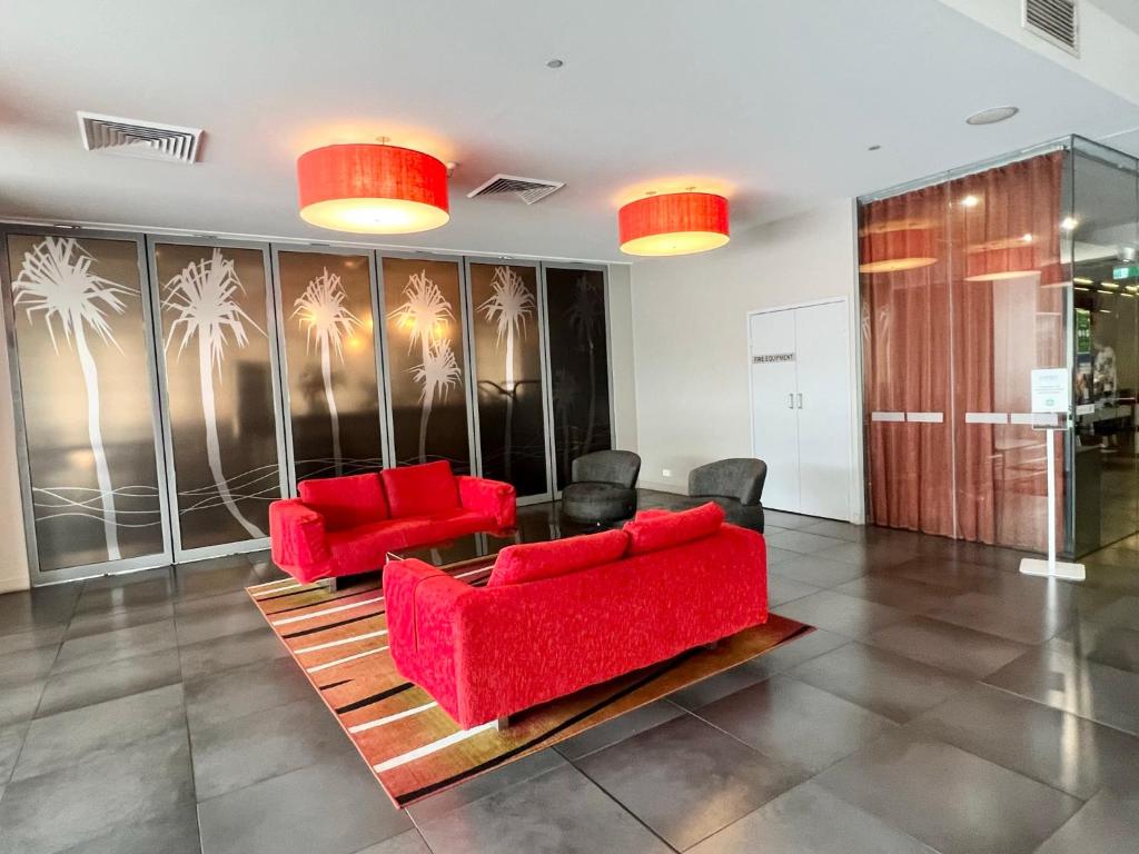 Prostor za sedenje u objektu Pandanas Apt 3 (Darwin CBD, Harbour views)