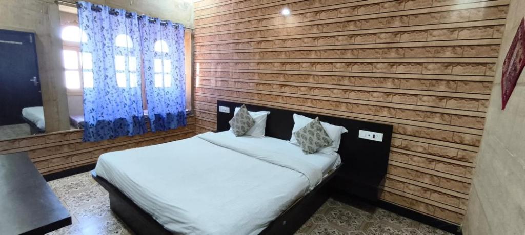Postel nebo postele na pokoji v ubytování Tofu Guesthouse