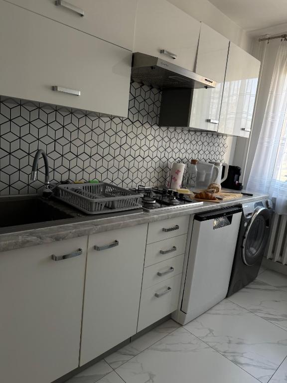 Kuchyňa alebo kuchynka v ubytovaní Apartament -Jak w domu- Czeladź 60m2 Centrum Katowic 10km