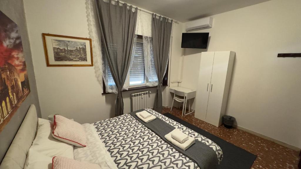 Posteľ alebo postele v izbe v ubytovaní Bella Roma - EE
