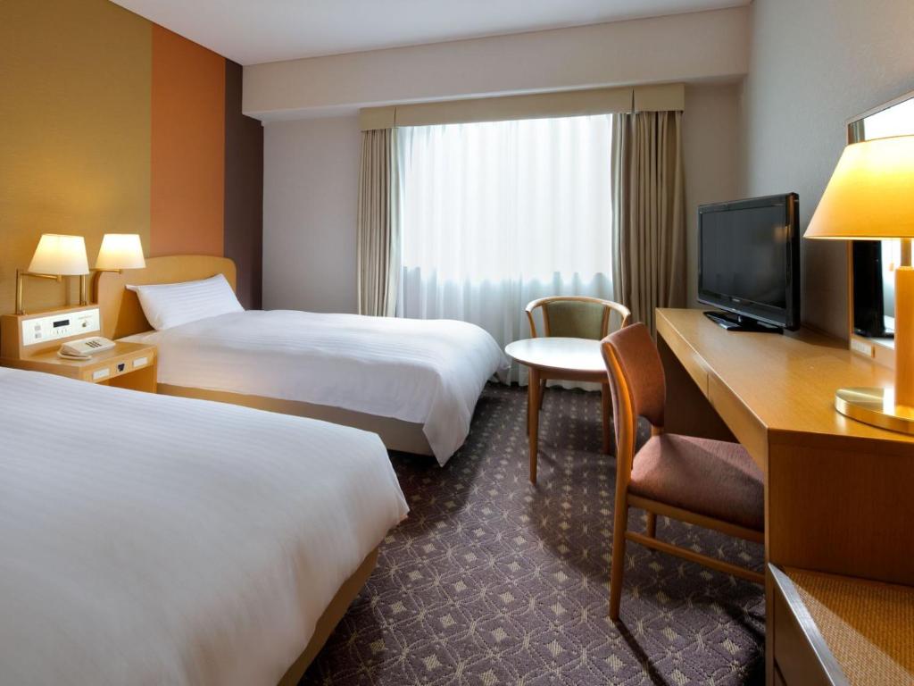 TV a/nebo společenská místnost v ubytování Miyako Hotel Kyoto Hachijo
