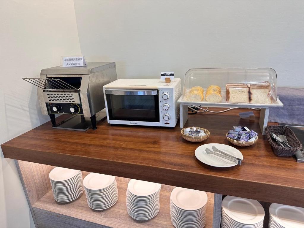 Kuchyň nebo kuchyňský kout v ubytování 沐舍-蜜滋賀溫泉飯店
