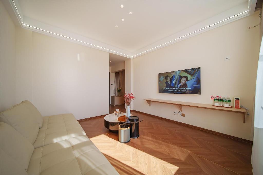 TV a/nebo společenská místnost v ubytování Jianshui Yunshui Inn