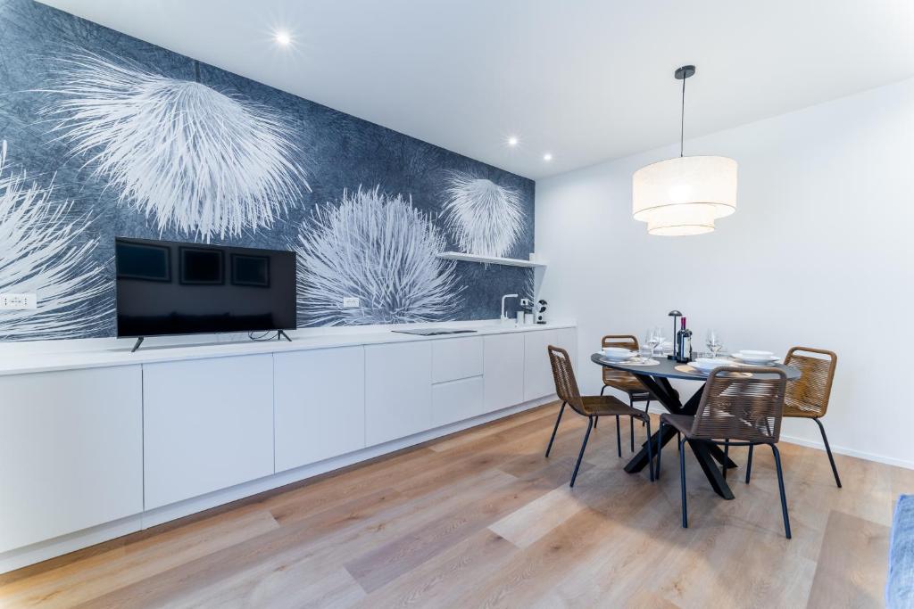 TV a/nebo společenská místnost v ubytování Pico Apartment 50
