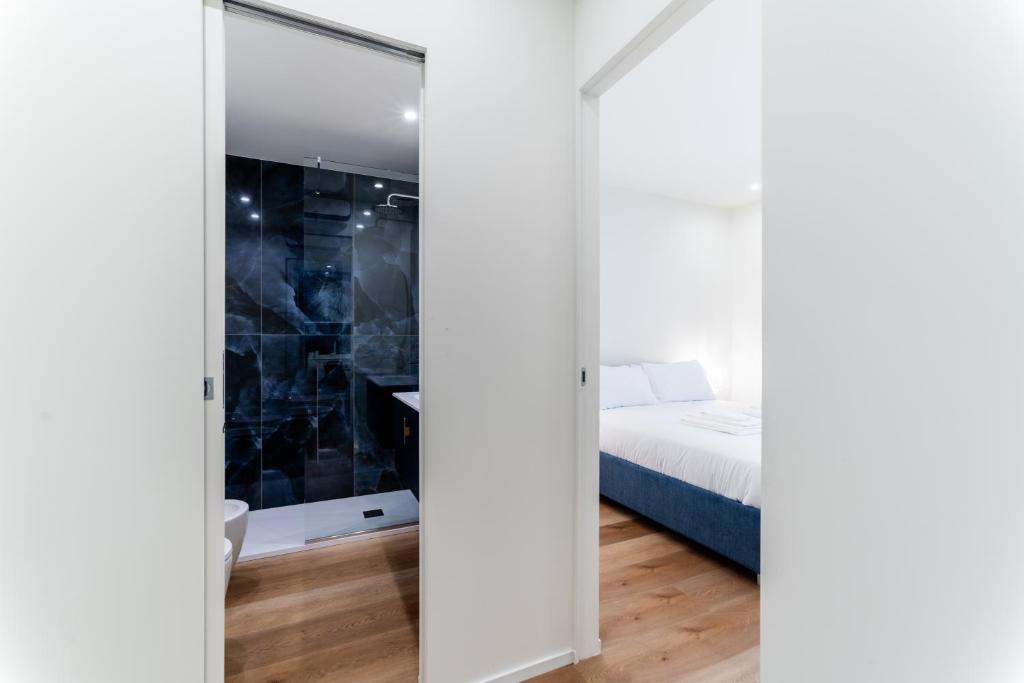 Postel nebo postele na pokoji v ubytování Pico Apartment 50