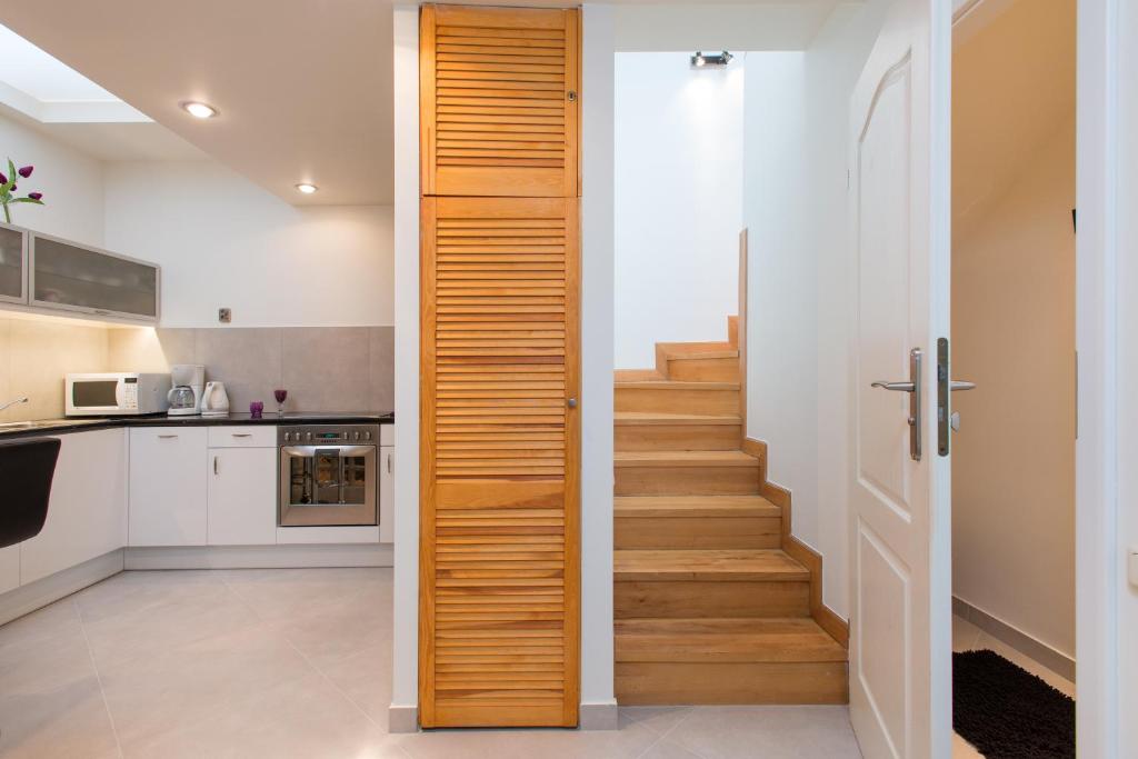 Kuchyňa alebo kuchynka v ubytovaní Neo Apartments