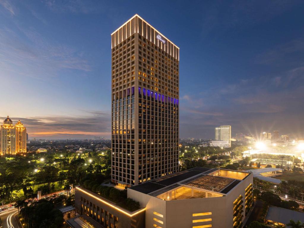 Nespecifikovaný výhled na destinaci Jakarta nebo výhled na město při pohledu z hotelu