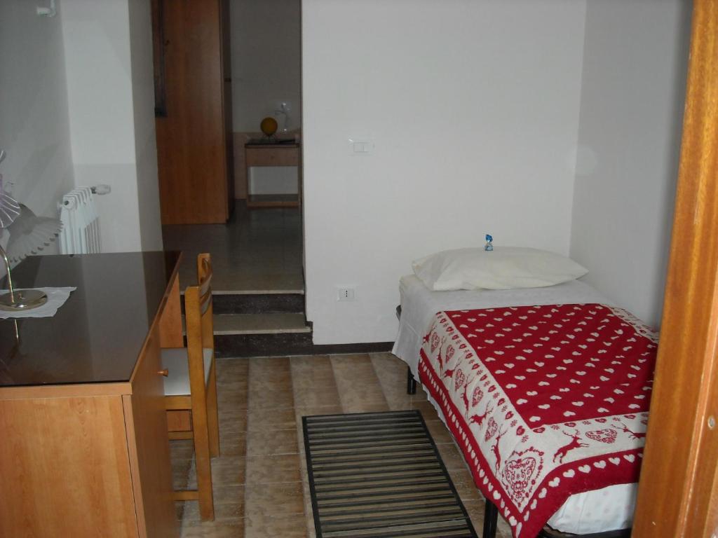 Postel nebo postele na pokoji v ubytování B&B Corte Bezzetti