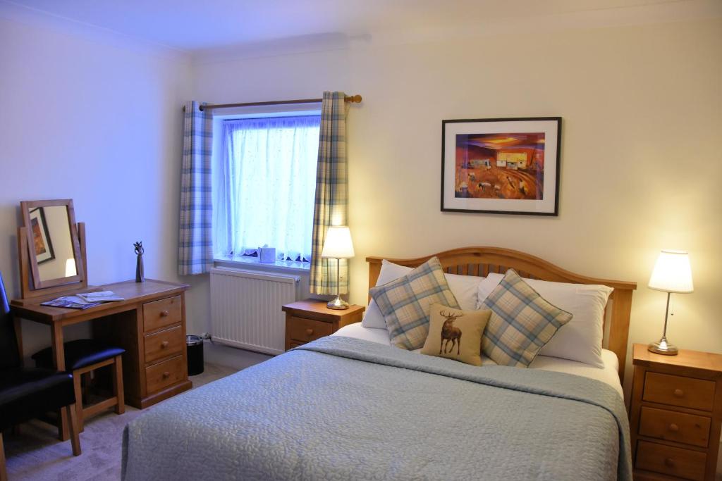 Postel nebo postele na pokoji v ubytování Lochview House