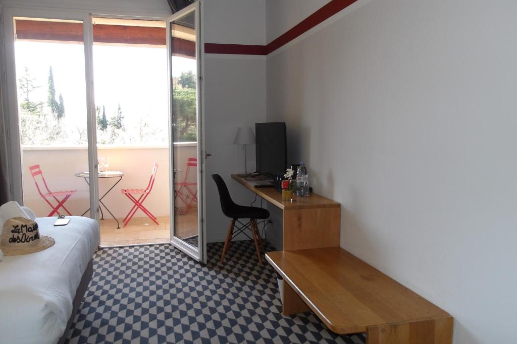 TV a/nebo společenská místnost v ubytování La Maison des Ocres - Provence