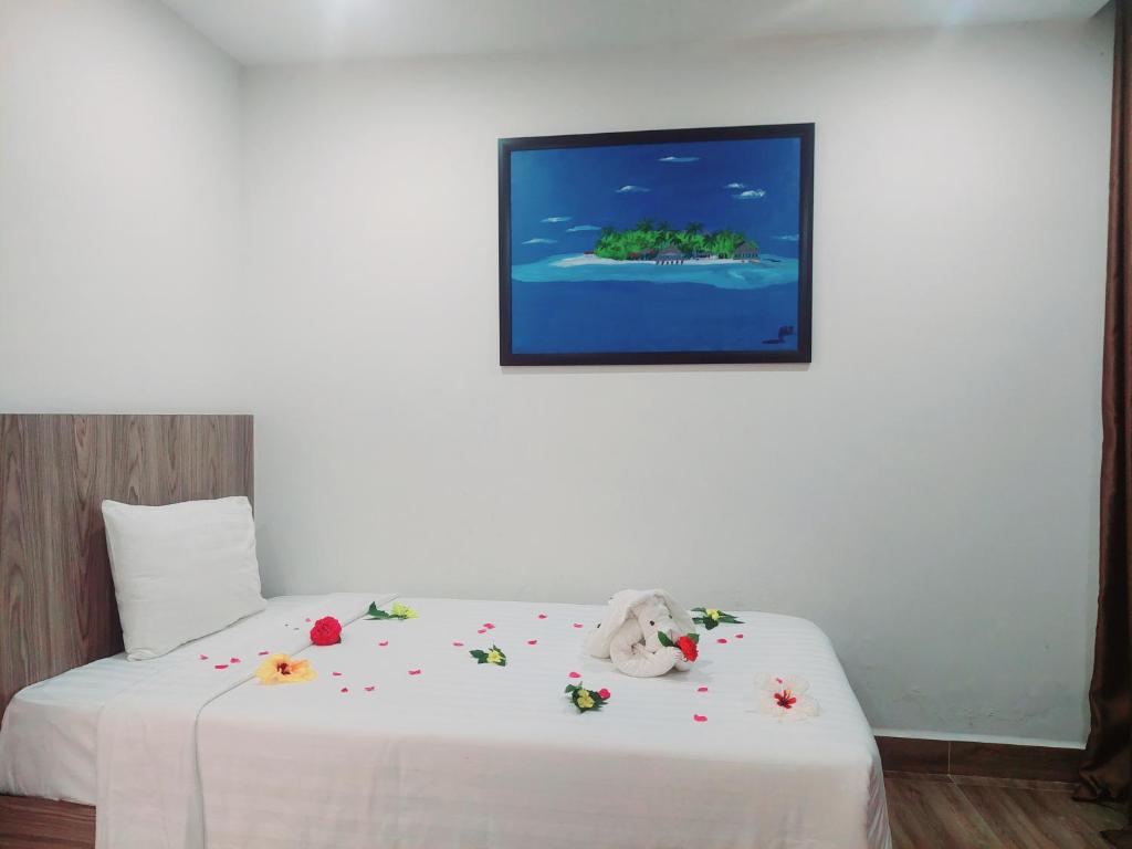 Postel nebo postele na pokoji v ubytování An Villa Beach Paradise