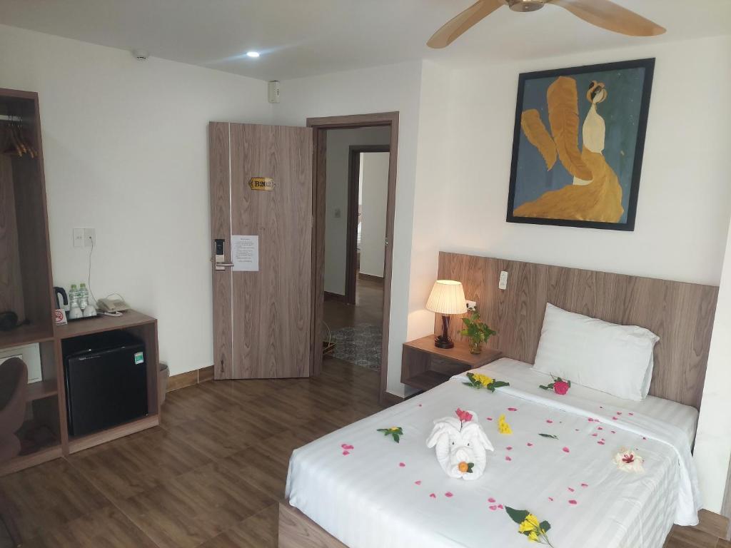Postel nebo postele na pokoji v ubytování An Villa Beach Paradise