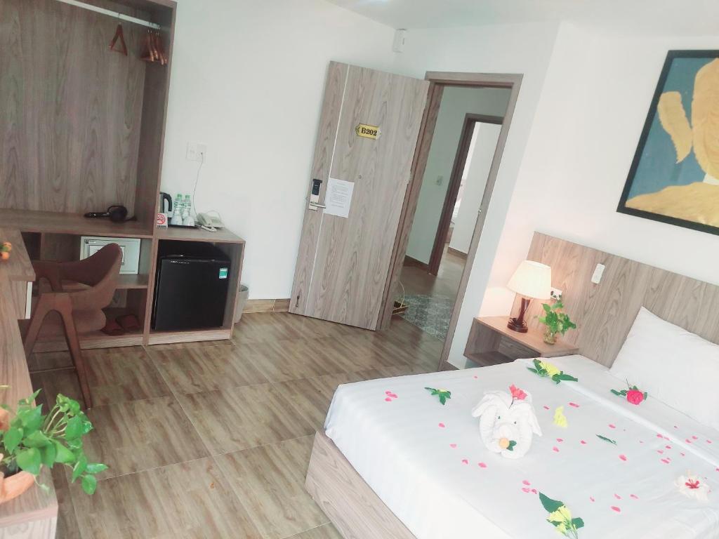 Postel nebo postele na pokoji v ubytování An Villa Beach Paradise