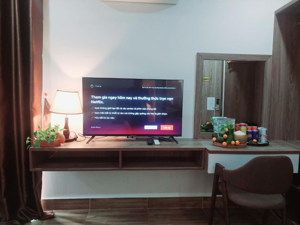 TV a/nebo společenská místnost v ubytování An Villa Beach Paradise