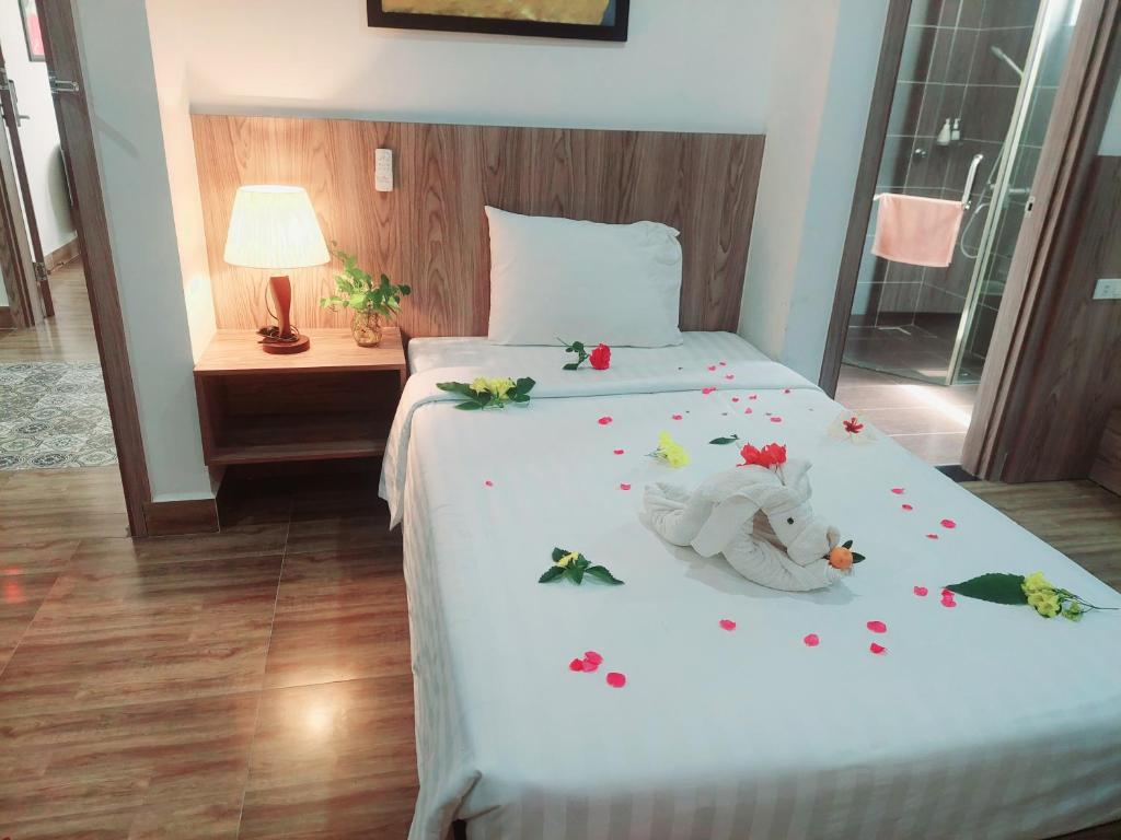 Postel nebo postele na pokoji v ubytování An Villa Beach Paradise