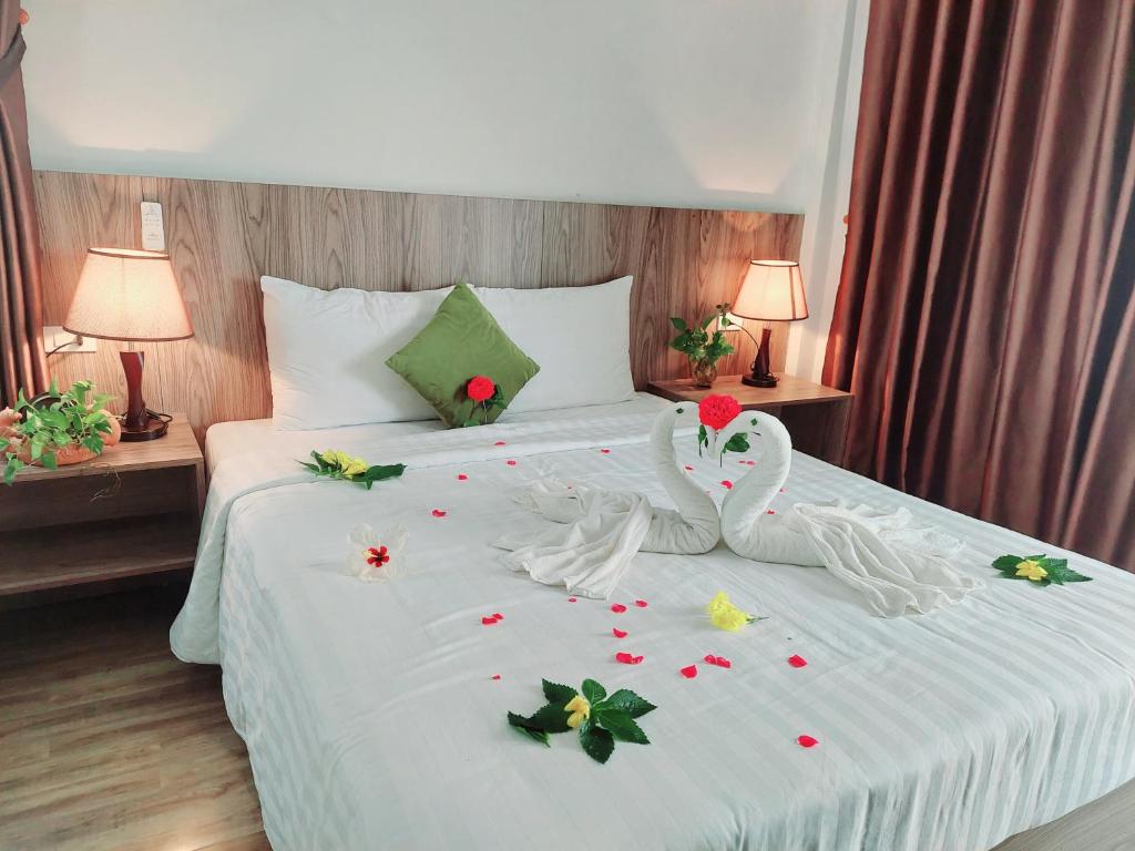 Postel nebo postele na pokoji v ubytování An Villa Beach Paradise