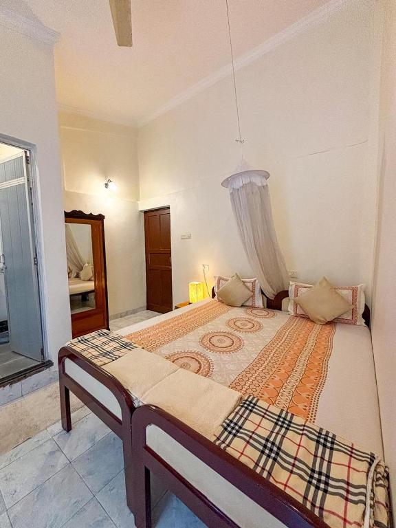 Postel nebo postele na pokoji v ubytování Dmellos Sea View Home