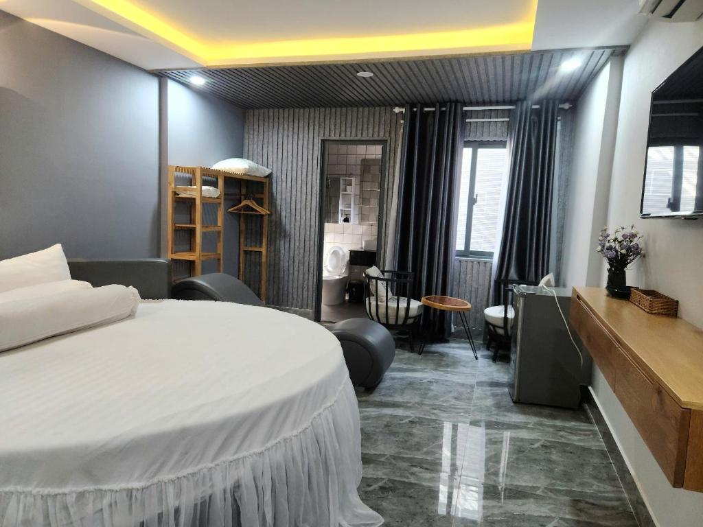 Postel nebo postele na pokoji v ubytování Hotel & Homestay LABUBU