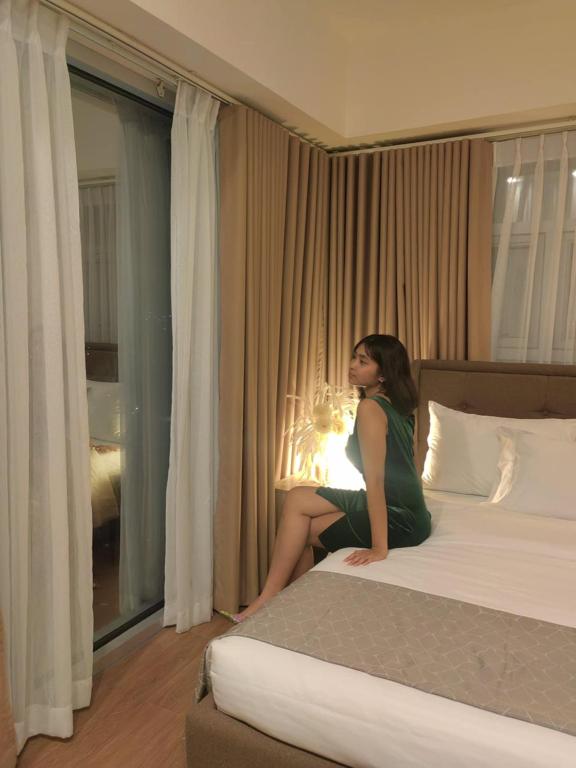 Postel nebo postele na pokoji v ubytování S&R Staycation Davao - Spacious 1Bedroom & Fully Equipped Unit Beside Abreeza Mall
