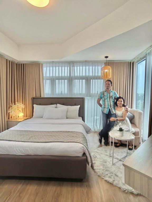 Postel nebo postele na pokoji v ubytování S&R Staycation Davao - Spacious 1Bedroom & Fully Equipped Unit Beside Abreeza Mall