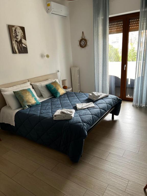 Postel nebo postele na pokoji v ubytování Appartamento AmareTrani