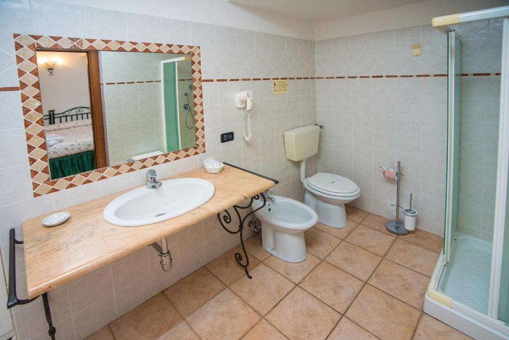 Koupelna v ubytování Albergo Le Macinaie - Monte Amiata
