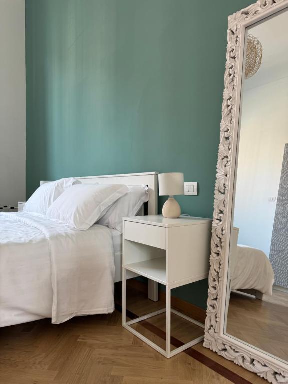 Posteľ alebo postele v izbe v ubytovaní Cozy Loft Baia del Re - Navigli