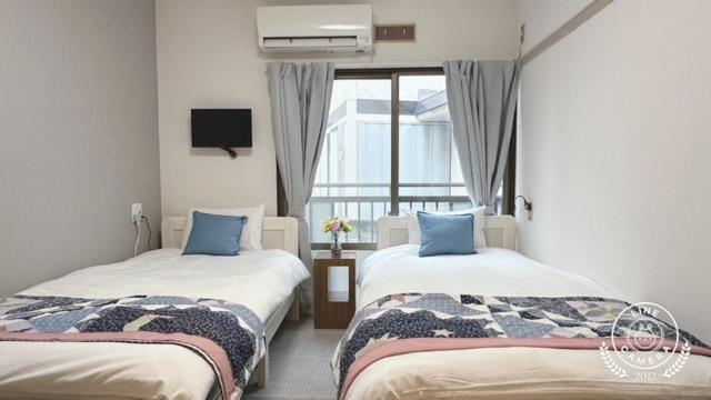 Postel nebo postele na pokoji v ubytování Momo palace
