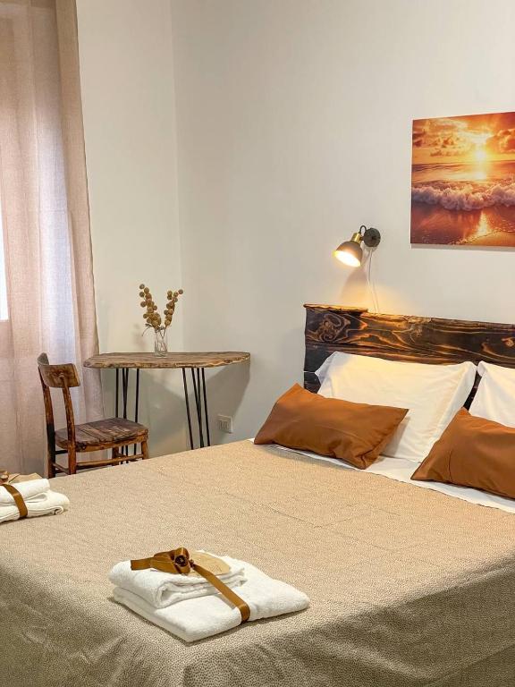 Postel nebo postele na pokoji v ubytování Big Fish Alghero Guesthouse