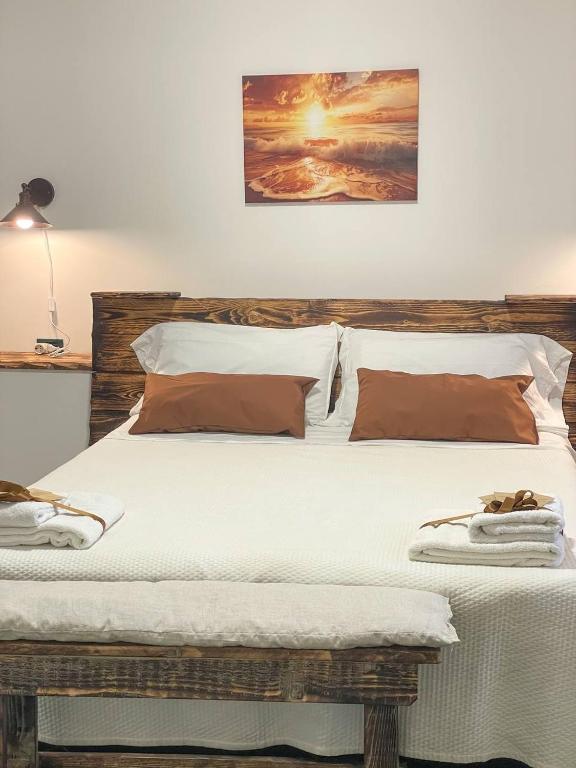 Postel nebo postele na pokoji v ubytování Big Fish Alghero Guesthouse