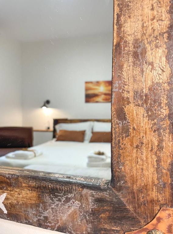 Postel nebo postele na pokoji v ubytování Big Fish Alghero Guesthouse