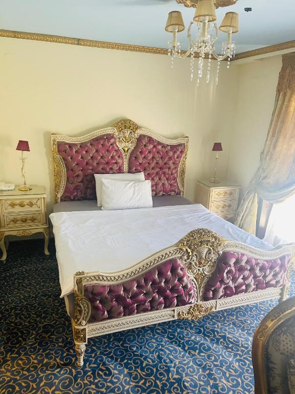 Postel nebo postele na pokoji v ubytování Hotel Stern