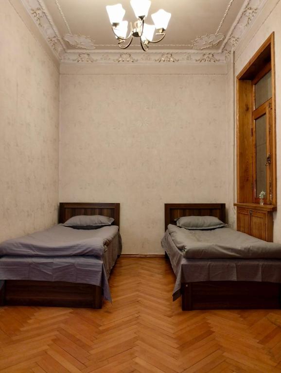 Letto o letti in una camera di Long Tree Hostel - Comfy Mattress