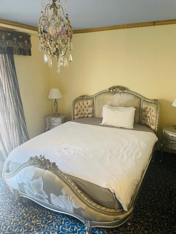 Postel nebo postele na pokoji v ubytování Hotel Stern