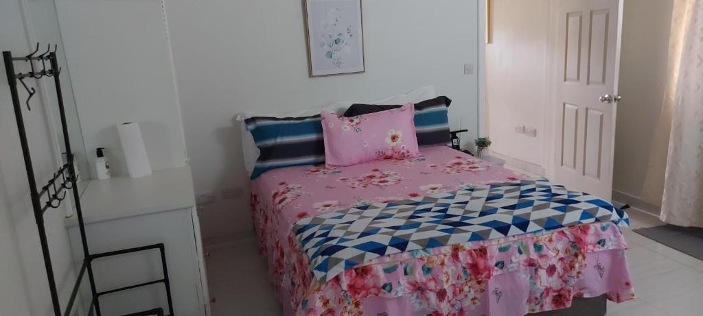 Postel nebo postele na pokoji v ubytování Pristine Stay Dominica
