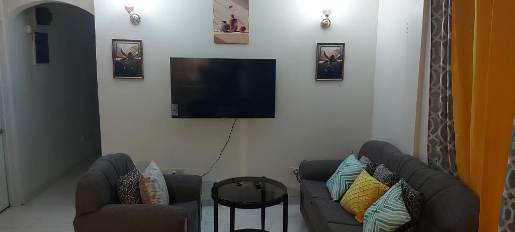 TV a/nebo společenská místnost v ubytování Pristine Stay Dominica