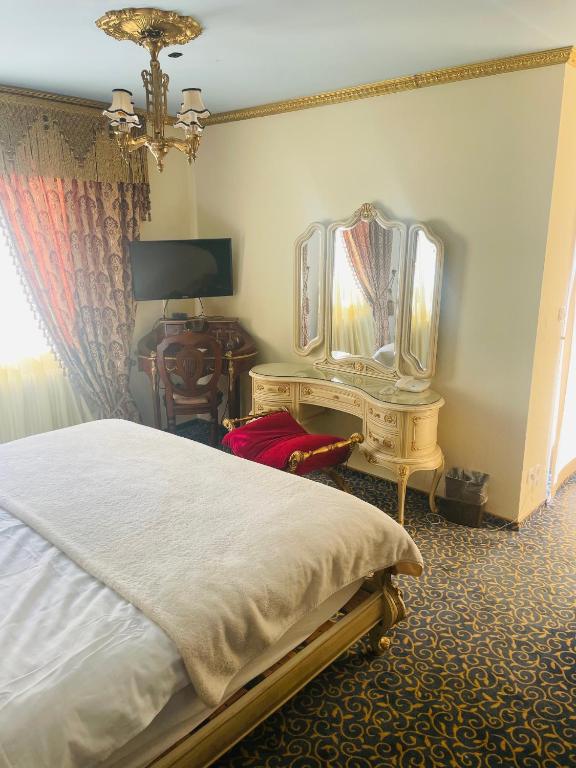 Postel nebo postele na pokoji v ubytování Hotel Stern