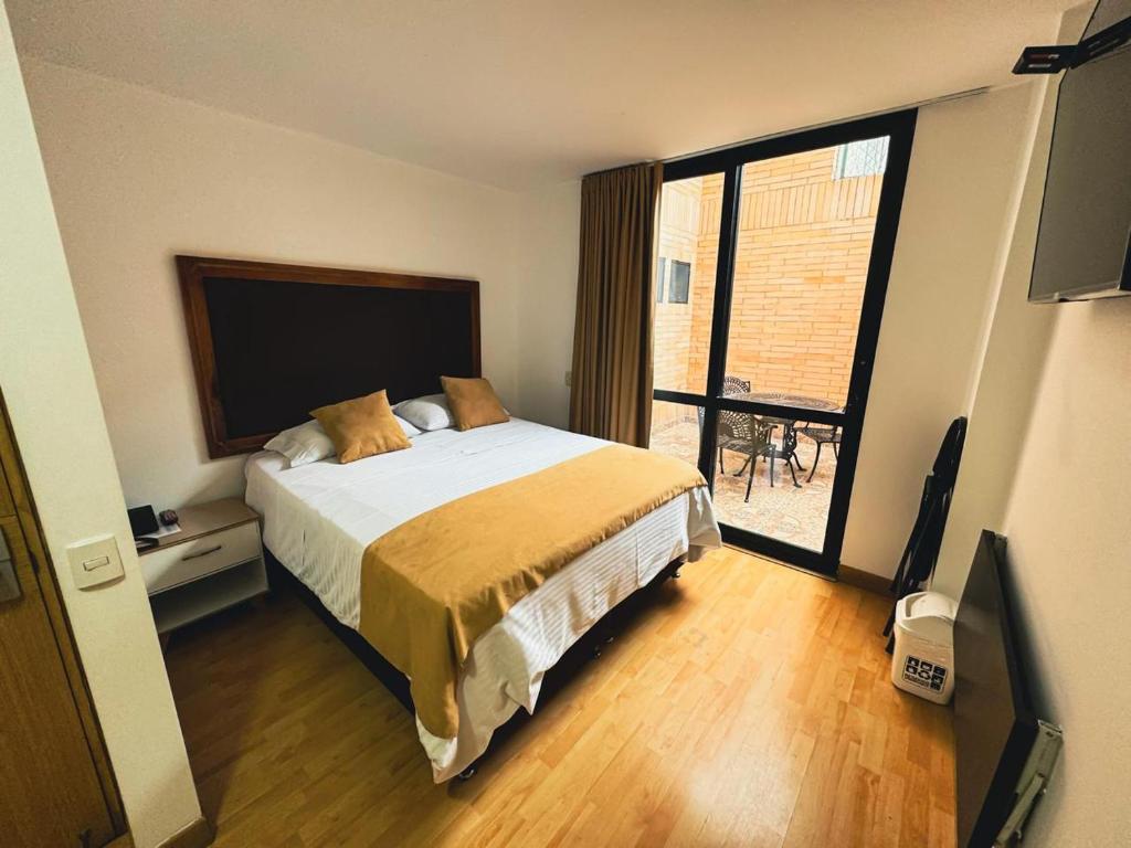 Postel nebo postele na pokoji v ubytování Hotel Dorado Ferial