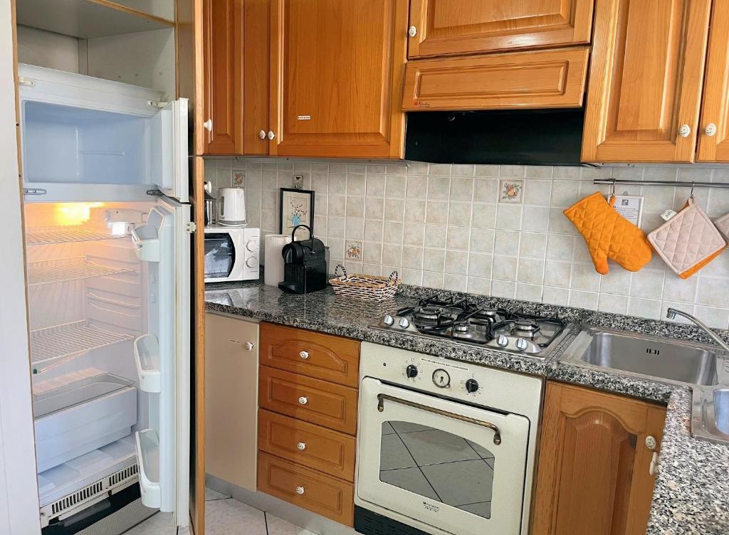 Kuchnia lub aneks kuchenny w obiekcie Comfort House Pisa