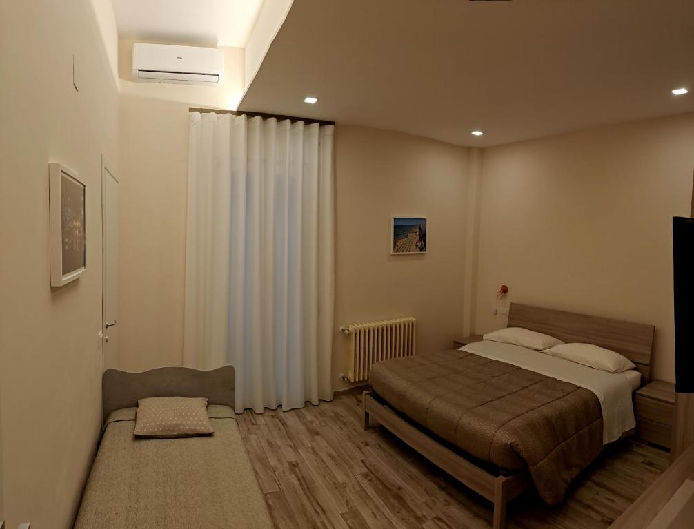 Postel nebo postele na pokoji v ubytování Daisy