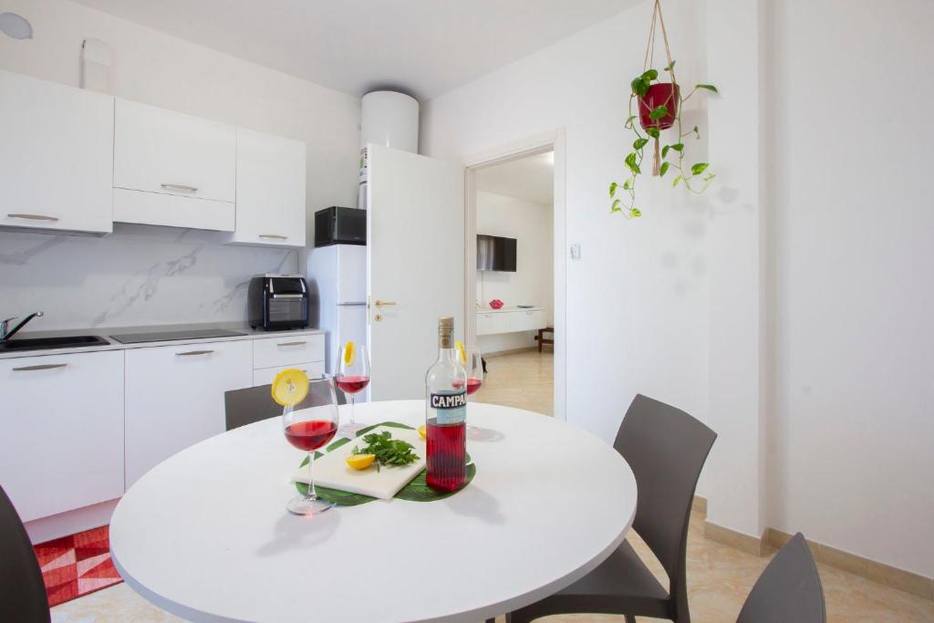 Kuchyň nebo kuchyňský kout v ubytování A3 CASA MAGNOLIA - Rho Fiera Mi- MODERNO TRILOCALE -Malpensa