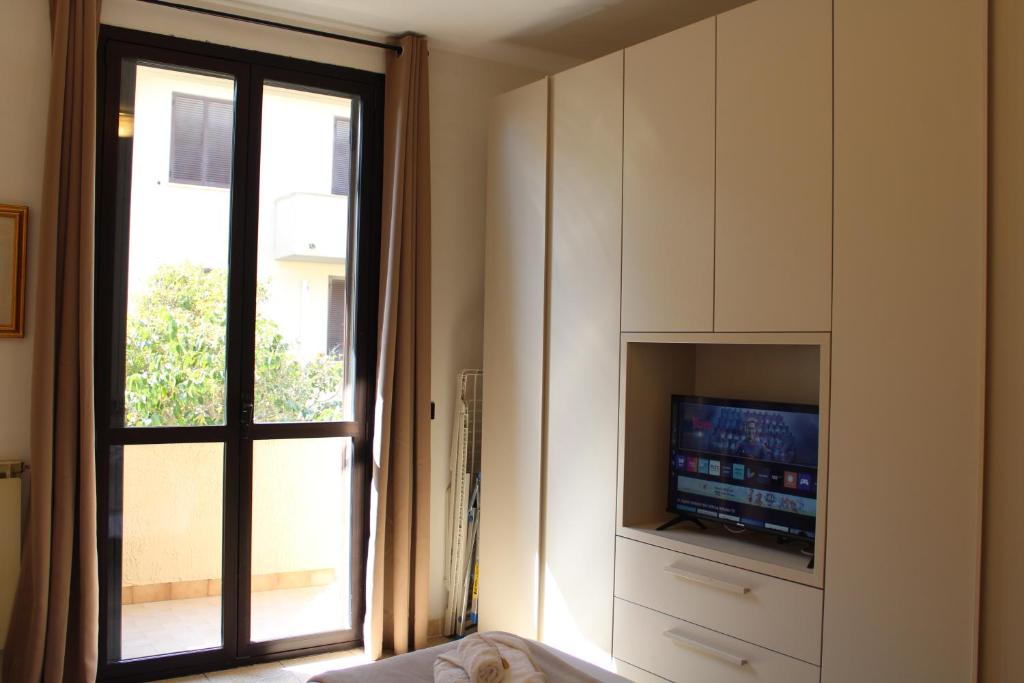 TV a/nebo společenská místnost v ubytování Casa Giuliva