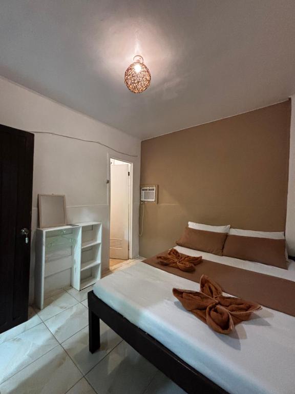 Postel nebo postele na pokoji v ubytování Paradiso Hostel El nido